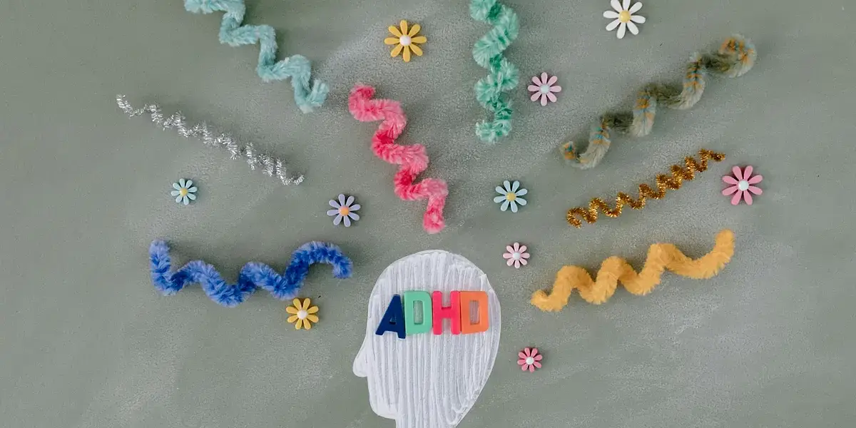 Creative illustration highlighting ADHD awareness with colorful brain imagery.